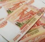روسي يفوز ب 11مليون دولار في اليانصيب 